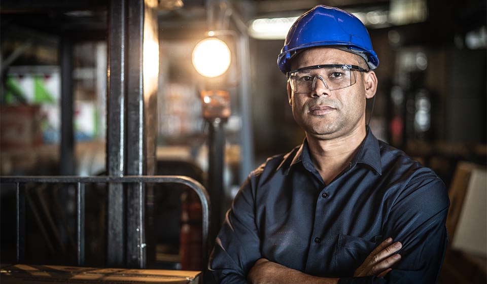 Miner wearing safety glasses at mining site