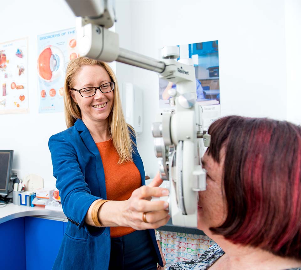 Gareth Edwards Optometrist team member testing patient's eyes