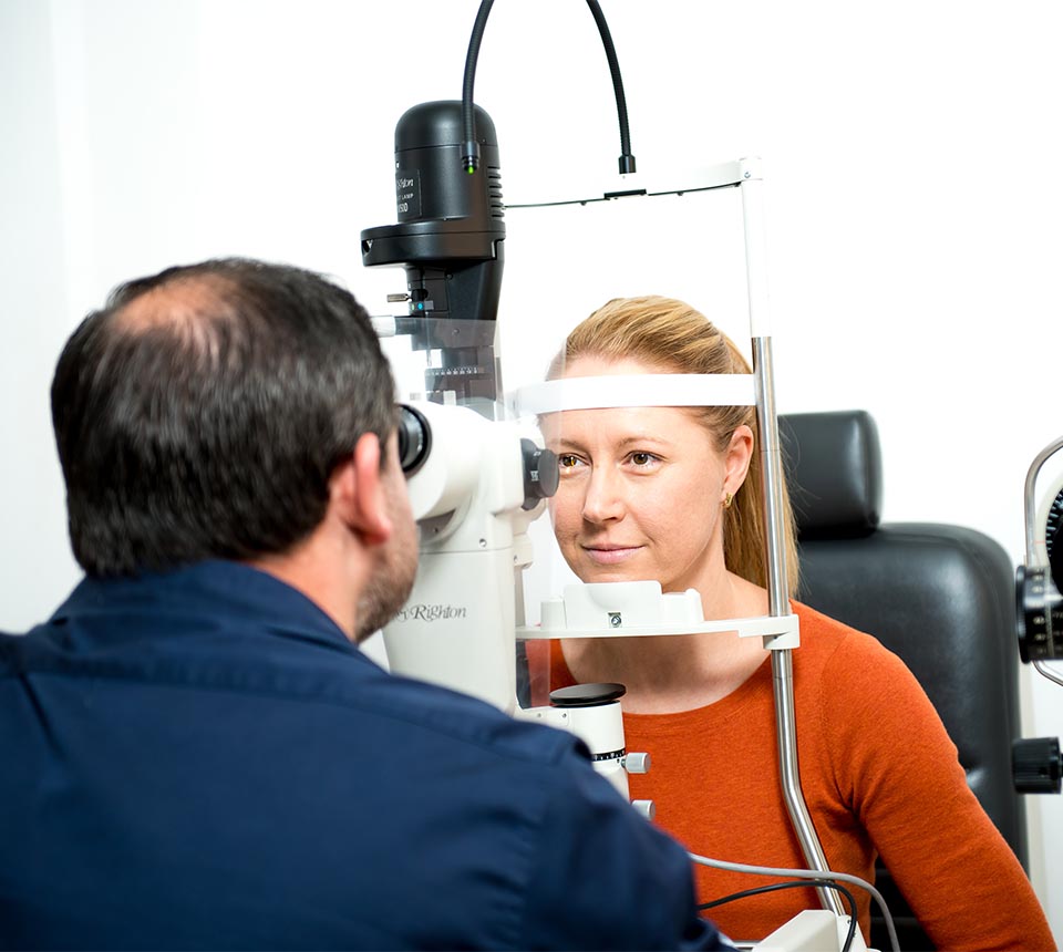 Gareth Edwards checking the eye health of a patient
